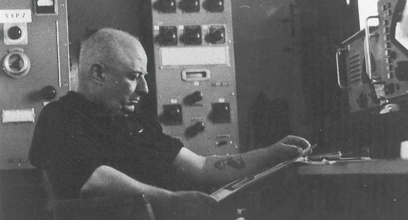 Nikos Kavvadias reading at the radio room.jpg